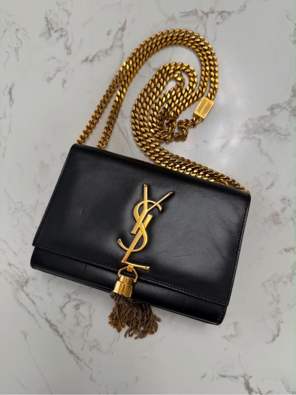 Saint Laurent Black Leather Shoulder Bag with Gold Tassel Chain